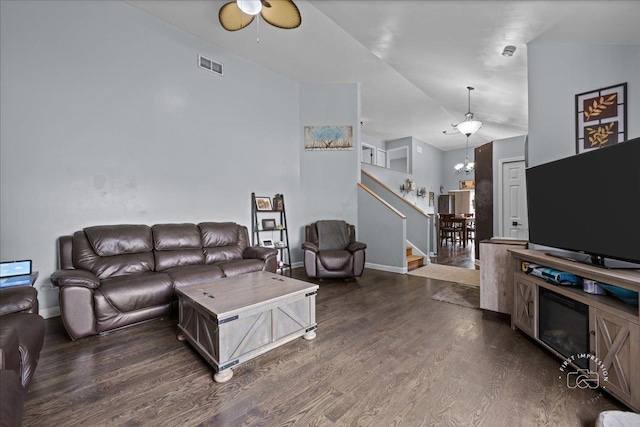 4756 Flanders Ct, Plainfield, IL 60586 - living area featuring dark wood-type flooring, stairs, and ceiling fan