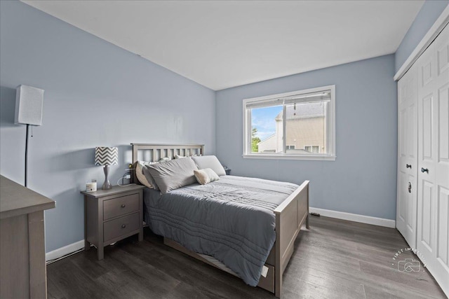 4756 Flanders Ct, Plainfield, IL 60586 - bedroom with a closet, dark wood-type flooring, and lofted ceiling