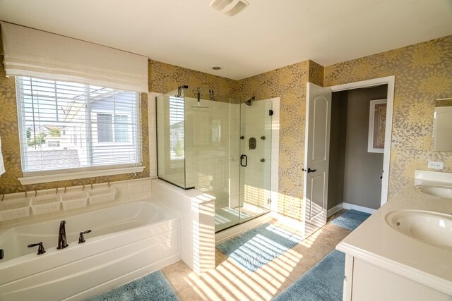 14924 S Case St, Plainfield, IL 60544 - bathroom with a stall shower, a bath, double vanity, and wallpapered walls