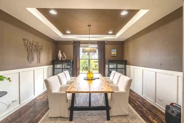 14924 S Case St, Plainfield, IL 60544 - dining area with a decorative wall, crown molding, a raised ceiling, wainscoting, and dark wood-style floors