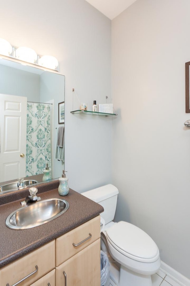 4124 N Kenmore Ave Unit Gs, Chicago, IL 60613 - bathroom with vanity, tile patterned flooring, and curtained shower