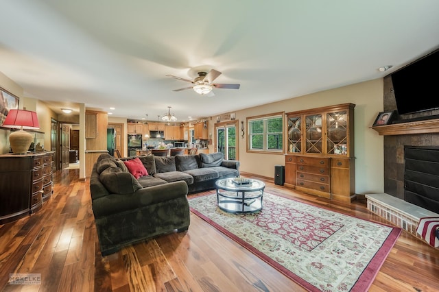 2800 Arbor Ln, Oswego, IL 60543 - living area with a large fireplace, ceiling fan, wood finished floors, and recessed lighting