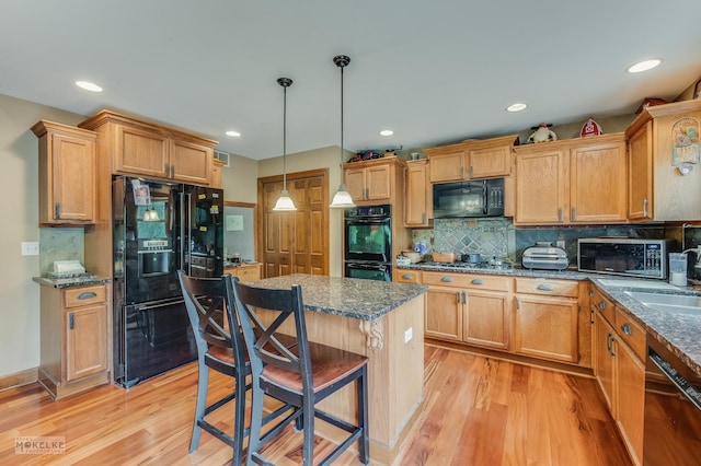 2800 Arbor Ln, Oswego, IL 60543 - kitchen featuring black appliances, light wood-style flooring, backsplash, and recessed lighting