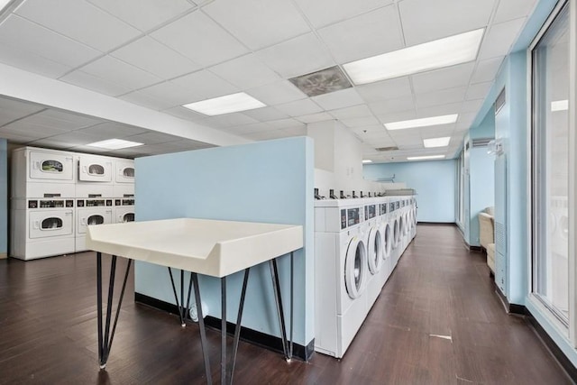 200 N Dearborn St Unit 2402, Chicago, IL 60601 - shared laundry room with stacked washer and clothes dryer, separate washer and dryer, and dark wood finished floors