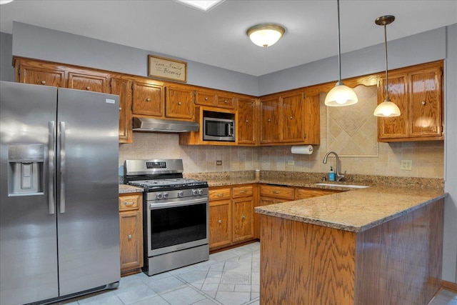 13610 S 84th Ave, Orland Park, IL 60462 - kitchen with stainless steel appliances, under cabinet range hood, brown cabinetry, and tasteful backsplash