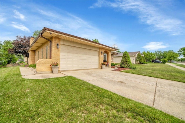 13610 S 84th Ave, Orland Park, IL 60462 - view of front facade featuring concrete driveway, a chimney, a garage, brick siding, and a front lawn