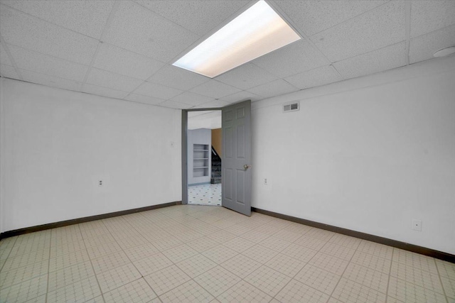 13610 S 84th Ave, Orland Park, IL 60462 - spare room featuring a paneled ceiling and stairway