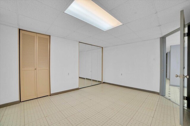 13610 S 84th Ave, Orland Park, IL 60462 - unfurnished bedroom with a drop ceiling and baseboards