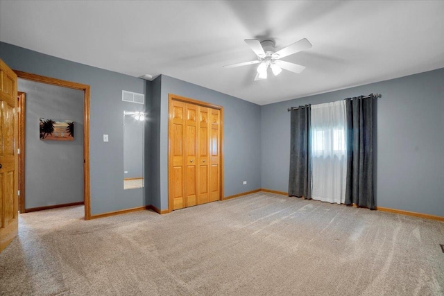 13610 S 84th Ave, Orland Park, IL 60462 - unfurnished bedroom featuring light carpet, a closet, and ceiling fan