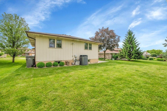 13610 S 84th Ave, Orland Park, IL 60462 - back of property featuring a yard, crawl space, and board and batten siding