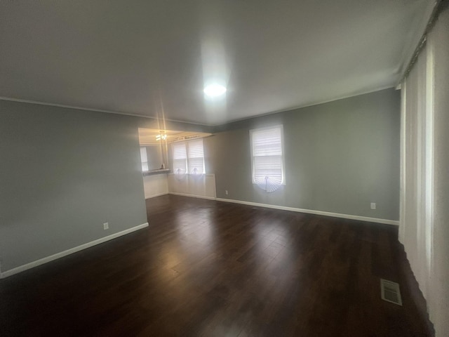 16939 Jodave Ave, Hazel Crest, IL 60429 - unfurnished room featuring dark wood-style flooring and ornamental molding