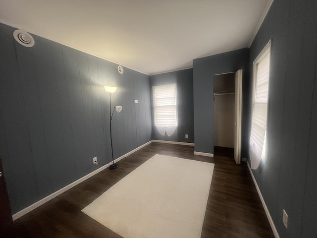 16939 Jodave Ave, Hazel Crest, IL 60429 - unfurnished bedroom featuring dark wood finished floors, a closet, and ornamental molding