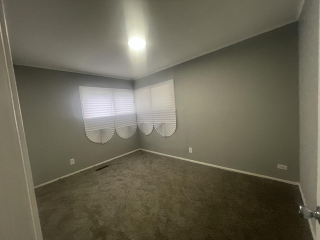 16939 Jodave Ave, Hazel Crest, IL 60429 - unfurnished room with dark colored carpet and baseboards