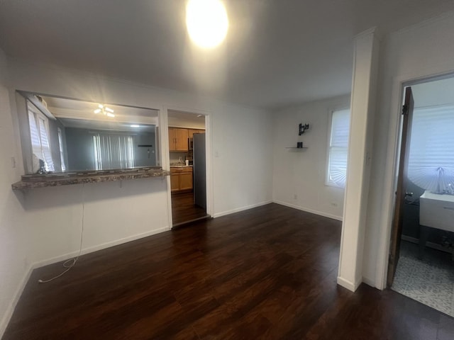 16939 Jodave Ave, Hazel Crest, IL 60429 - spare room with dark wood-type flooring and baseboards
