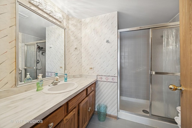 6419 Oak Forest Ave Unit 1N, Tinley Park, IL 60477 - bathroom with a stall shower, vanity, and tile patterned flooring