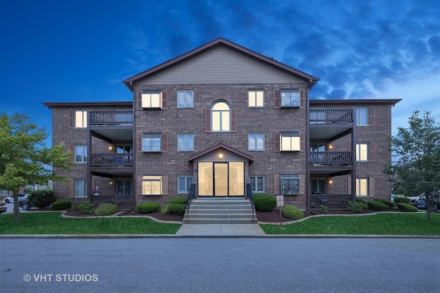 6419 Oak Forest Ave Unit 1N, Tinley Park, IL 60477 - view of front of home featuring a balcony and brick siding