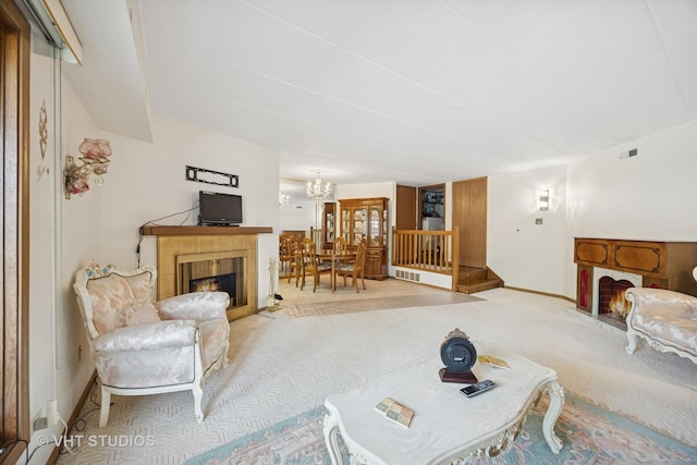 6419 Oak Forest Ave Unit 1N, Tinley Park, IL 60477 - living room featuring a fireplace, carpet flooring, and a chandelier