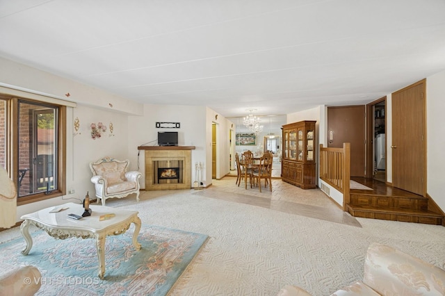 6419 Oak Forest Ave Unit 1N, Tinley Park, IL 60477 - living area featuring carpet flooring, a chandelier, and a tiled fireplace