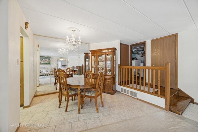 6419 Oak Forest Ave Unit 1N, Tinley Park, IL 60477 - dining room featuring a chandelier and washer / dryer