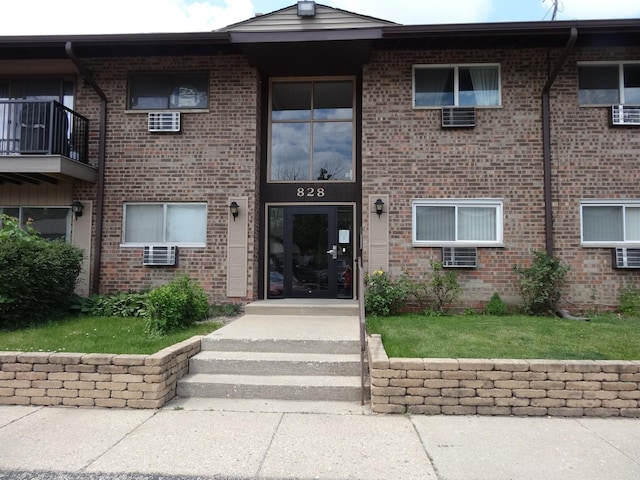 828 E Old Willow Rd Unit 109, Prospect Heights, IL 60070 - entrance to property with brick siding
