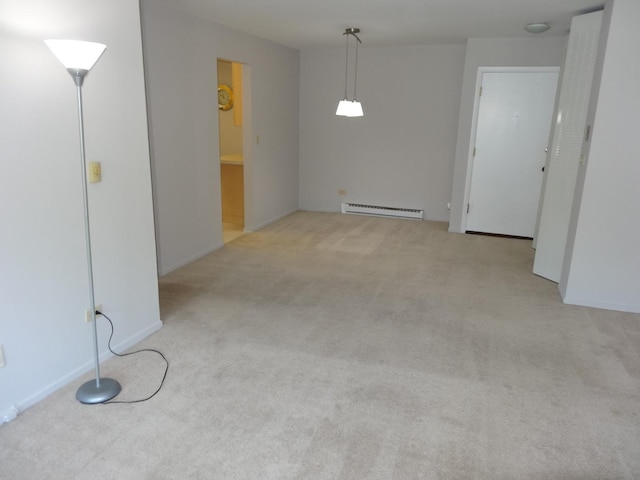 828 E Old Willow Rd Unit 109, Prospect Heights, IL 60070 - unfurnished room featuring a baseboard radiator and carpet flooring