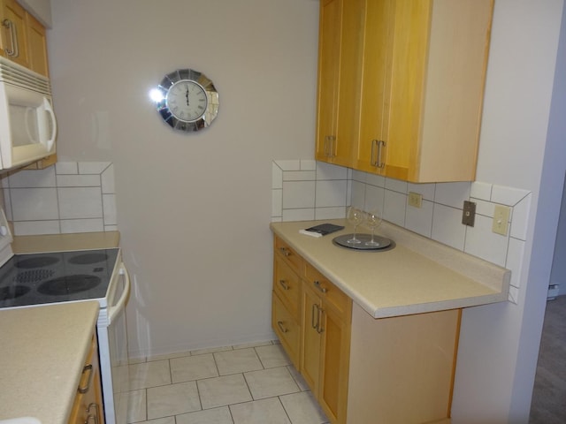 828 E Old Willow Rd Unit 109, Prospect Heights, IL 60070 - kitchen with white appliances, decorative backsplash, and light countertops