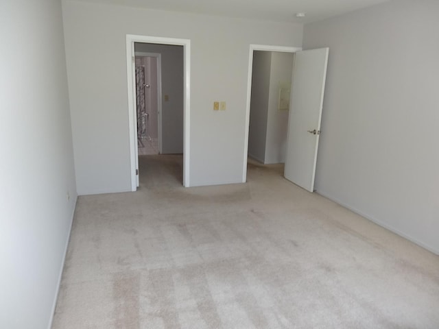 828 E Old Willow Rd Unit 109, Prospect Heights, IL 60070 - unfurnished bedroom with light colored carpet