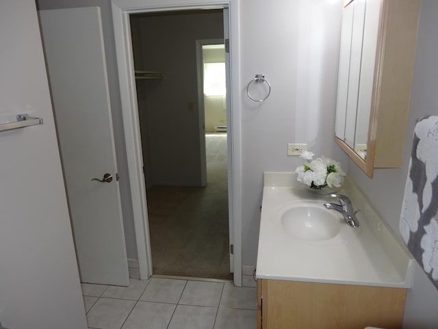 828 E Old Willow Rd Unit 109, Prospect Heights, IL 60070 - bathroom with vanity, tile patterned flooring, and a baseboard heating unit