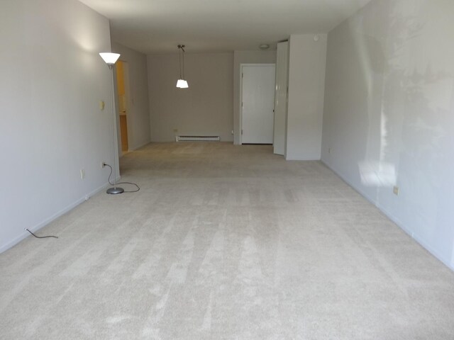 828 E Old Willow Rd Unit 109, Prospect Heights, IL 60070 - carpeted spare room with a baseboard radiator