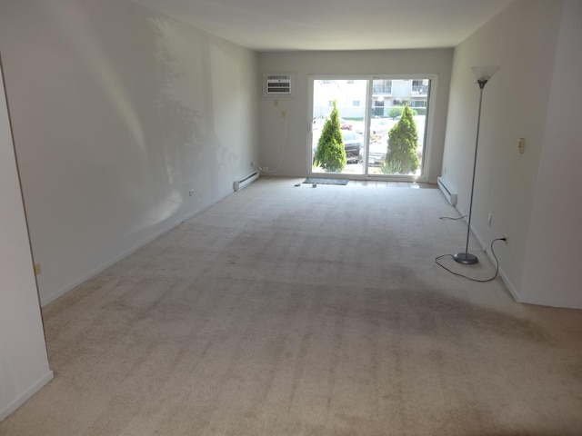 828 E Old Willow Rd Unit 109, Prospect Heights, IL 60070 - spare room with baseboard heating, carpet flooring, and a wall mounted air conditioner