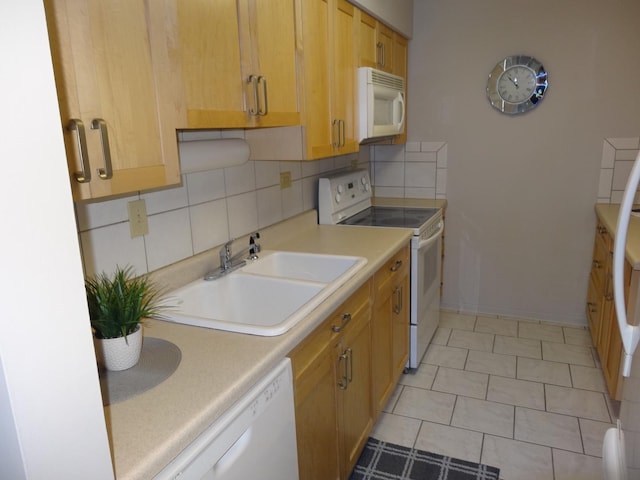 828 E Old Willow Rd Unit 109, Prospect Heights, IL 60070 - kitchen featuring white appliances, decorative backsplash, and light countertops