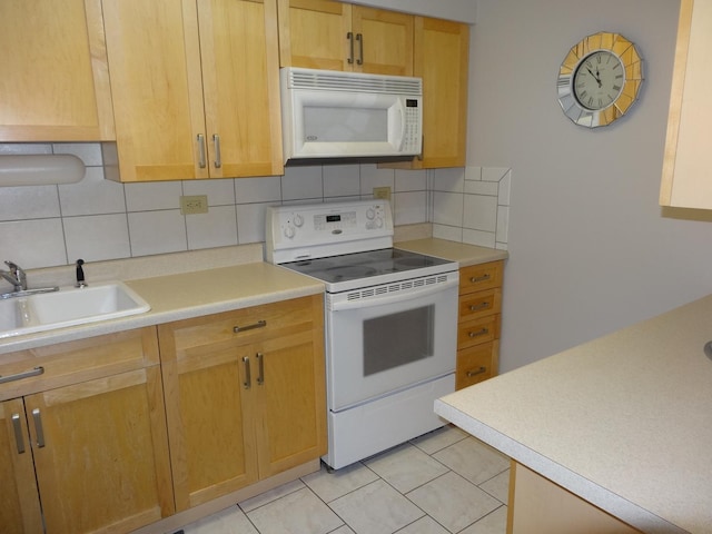 828 E Old Willow Rd Unit 109, Prospect Heights, IL 60070 - kitchen with white appliances, backsplash, light countertops, and light tile patterned floors