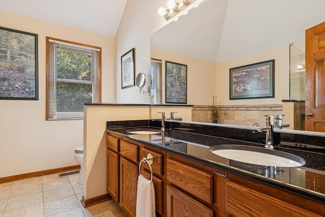 321 Breckenridge Dr, Aurora, IL 60504 - full bath featuring vaulted ceiling, double vanity, and tile patterned floors