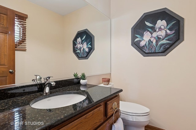 321 Breckenridge Dr, Aurora, IL 60504 - half bathroom featuring vanity and toilet