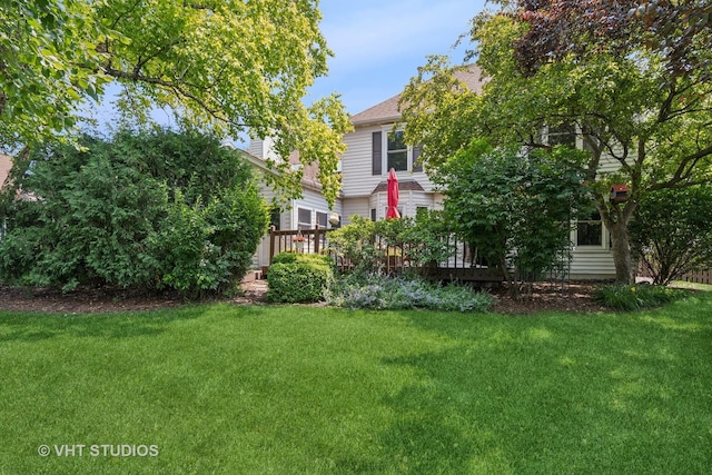 321 Breckenridge Dr, Aurora, IL 60504 - view of green lawn with a wooden deck
