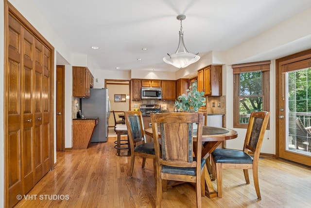 321 Breckenridge Dr, Aurora, IL 60504 - dining room with light wood finished floors and recessed lighting