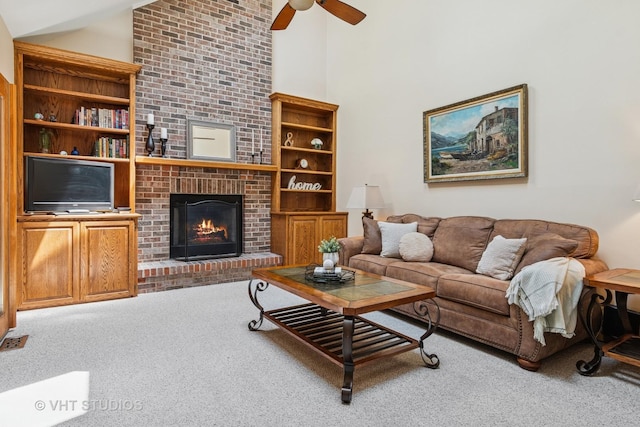 321 Breckenridge Dr, Aurora, IL 60504 - living room featuring carpet flooring, a brick fireplace, high vaulted ceiling, and ceiling fan