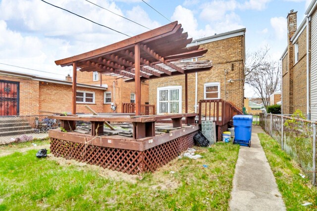 8619 S Jeffery Blvd, Chicago, IL 60617 - back of house with a pergola, a deck, and brick siding
