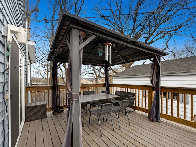 711 Illinois St, Lemont, IL 60439 - wooden deck featuring outdoor dining area and a gazebo