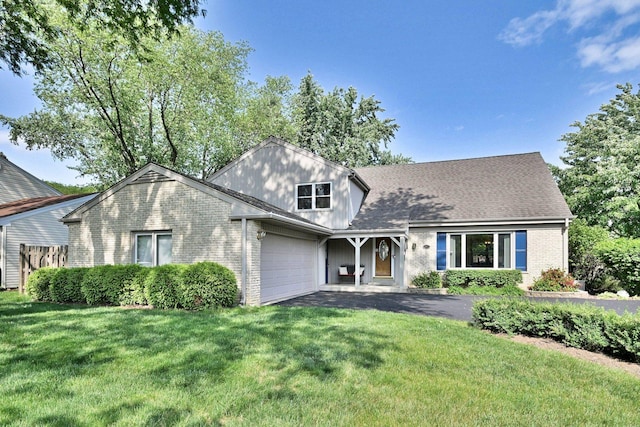 537 S Echo Ln, Palatine, IL 60067 - view of front facade featuring brick siding, a front lawn, an attached garage, and driveway