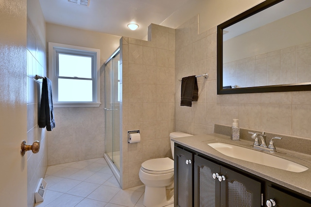 537 S Echo Ln, Palatine, IL 60067 - bathroom with tile walls, tile patterned flooring, vanity, and a shower stall