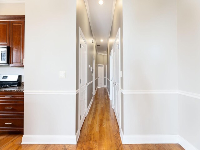 5445 N NW Hwy Unit 3N, Chicago, IL 60630 - corridor featuring light wood-type flooring and baseboards