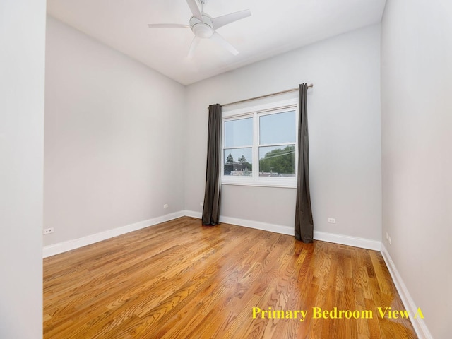 5445 N NW Hwy Unit 3N, Chicago, IL 60630 - spare room with light wood finished floors and a ceiling fan
