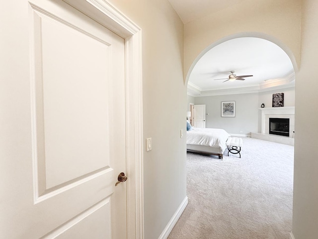 6N707 Brookhaven Ln, Saint Charles, IL 60175 - bedroom featuring carpet, arched walkways, crown molding, a fireplace, and ceiling fan