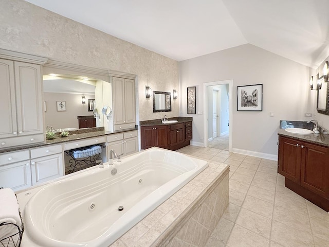 6N707 Brookhaven Ln, Saint Charles, IL 60175 - bathroom with a whirlpool tub, two vanities, vaulted ceiling, and tile patterned floors