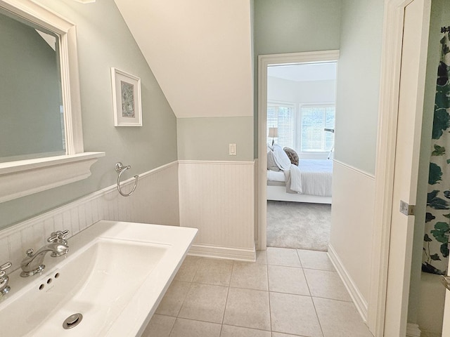 6N707 Brookhaven Ln, Saint Charles, IL 60175 - ensuite bathroom with a wainscoted wall, lofted ceiling, and tile patterned floors