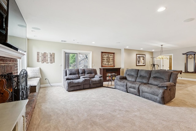6N707 Brookhaven Ln, Saint Charles, IL 60175 - living room featuring a brick fireplace, light colored carpet, and recessed lighting