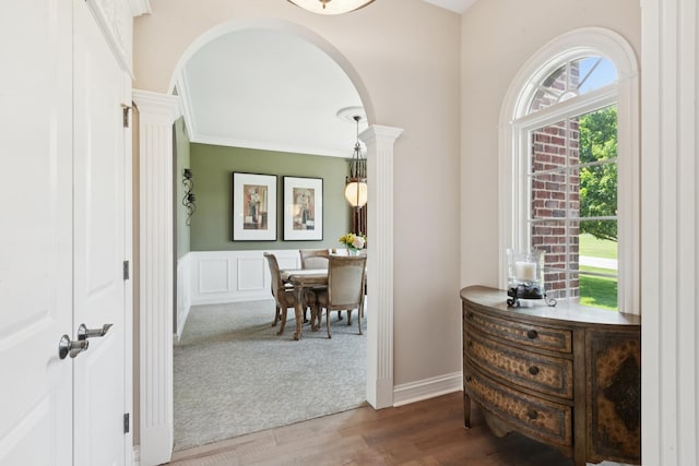 6N707 Brookhaven Ln, Saint Charles, IL 60175 - hallway featuring arched walkways, wood finished floors, and a wainscoted wall