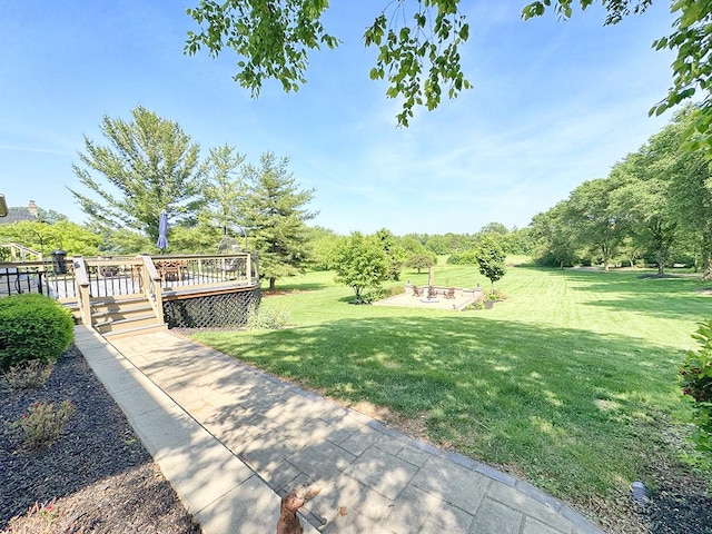6N707 Brookhaven Ln, Saint Charles, IL 60175 - view of grassy yard with a wooden deck