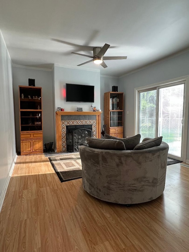 1416 S Robert Dr, Mount Prospect, IL 60056 - living room with a ceiling fan, wood finished floors, crown molding, and a fireplace